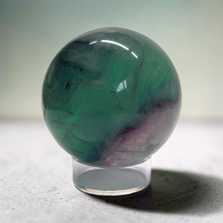Authentic fluorite crystal sphere for overstimulation. Shop online now or in-store with zen collection metaphysical store in barrie