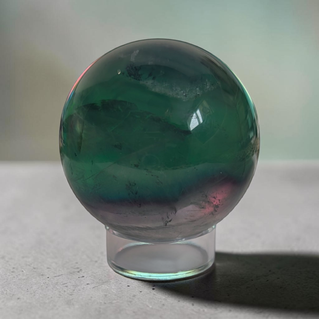 Authentic fluorite crystal sphere for overstimulation. Shop online now or in-store with zen collection metaphysical store in barrie