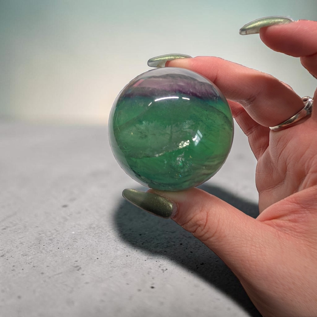 Authentic fluorite crystal sphere for overstimulation. Shop online now or in-store with zen collection metaphysical store in barrie
