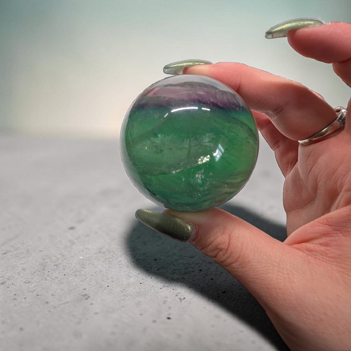 Authentic fluorite crystal sphere for overstimulation. Shop online now or in-store with zen collection metaphysical store in barrie