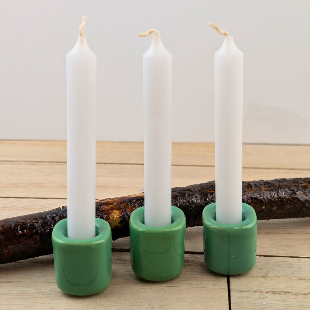 Minimalist green candle holder for rituals and meditation