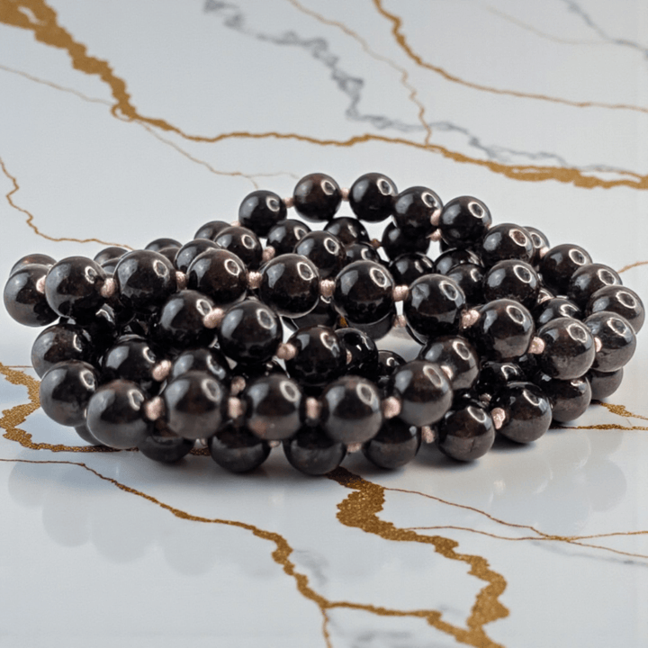 garnet meditation mala necklace available in-store or online with Zen Collection Metaphysical Store Canada