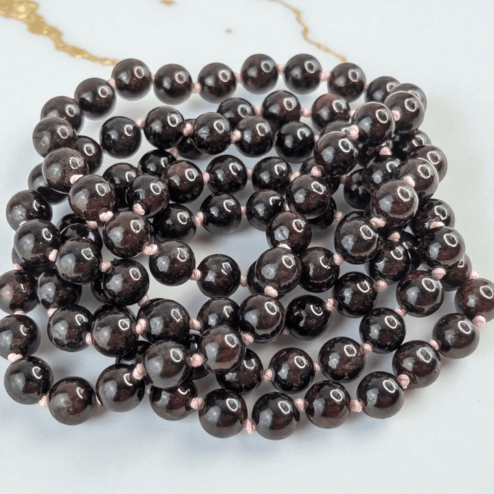 garnet meditation mala necklace available in-store or online with Zen Collection Metaphysical Store Canada