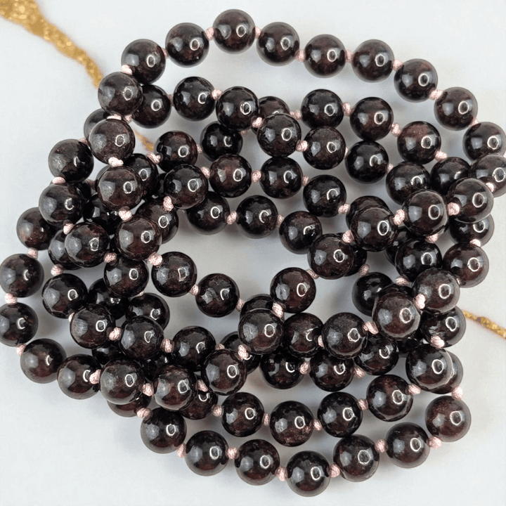 garnet meditation mala necklace available in-store or online with Zen Collection Metaphysical Store Canada