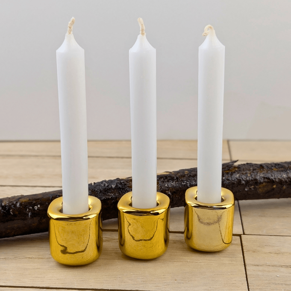 Reflective gold candle holder for rituals and meditation