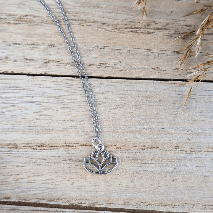 Graceful Lotus Pendant Necklace with a delicate silver-tone lotus flower design