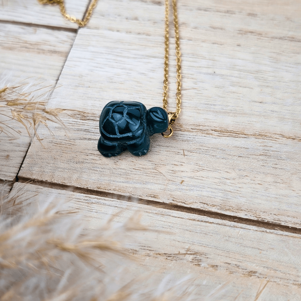 Gold-tone chain with a Green Agate Turtle pendant