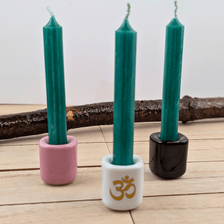 Green candle for grounding and abundance practices