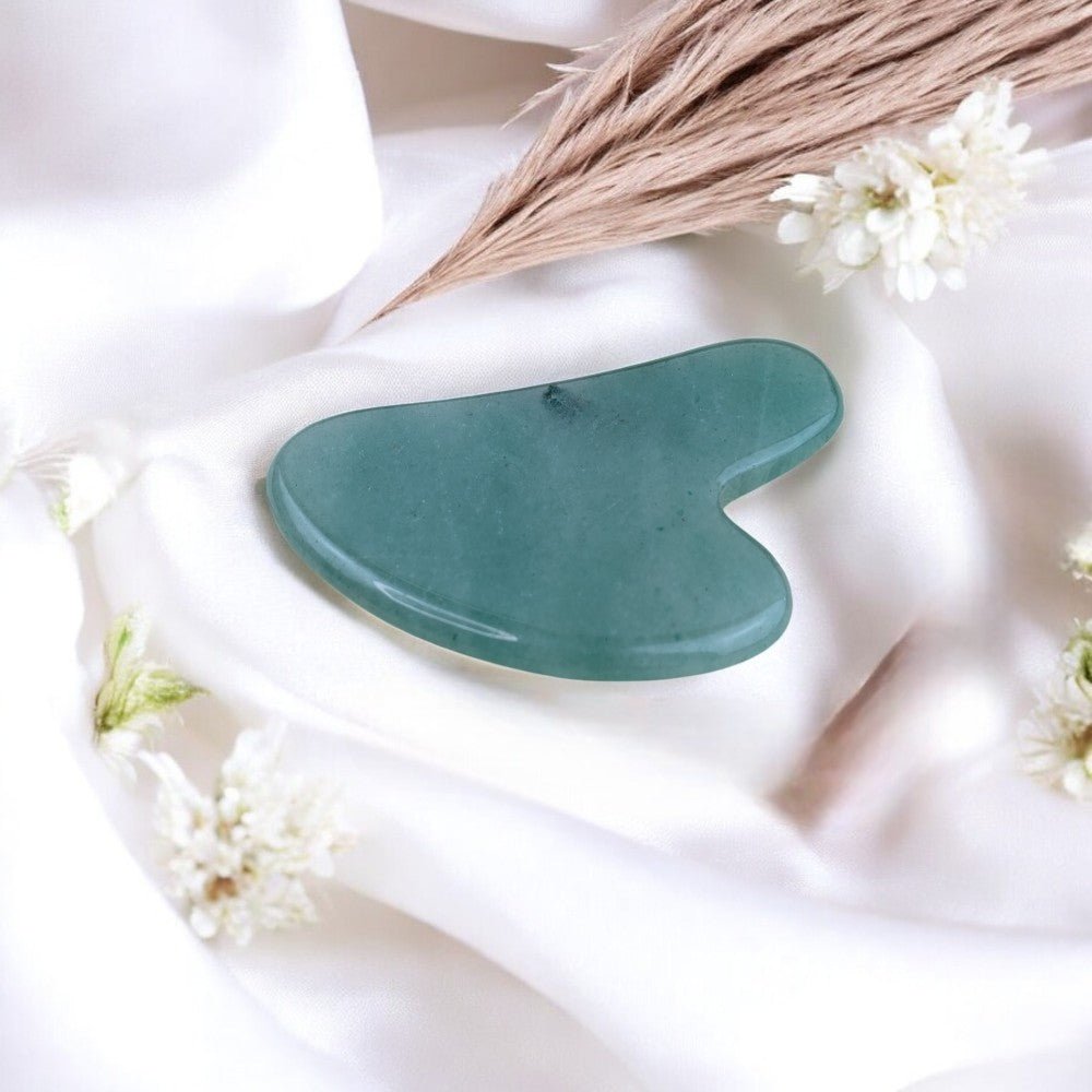 Gua sha tool designed for lymphatic drainage and emotional balance.