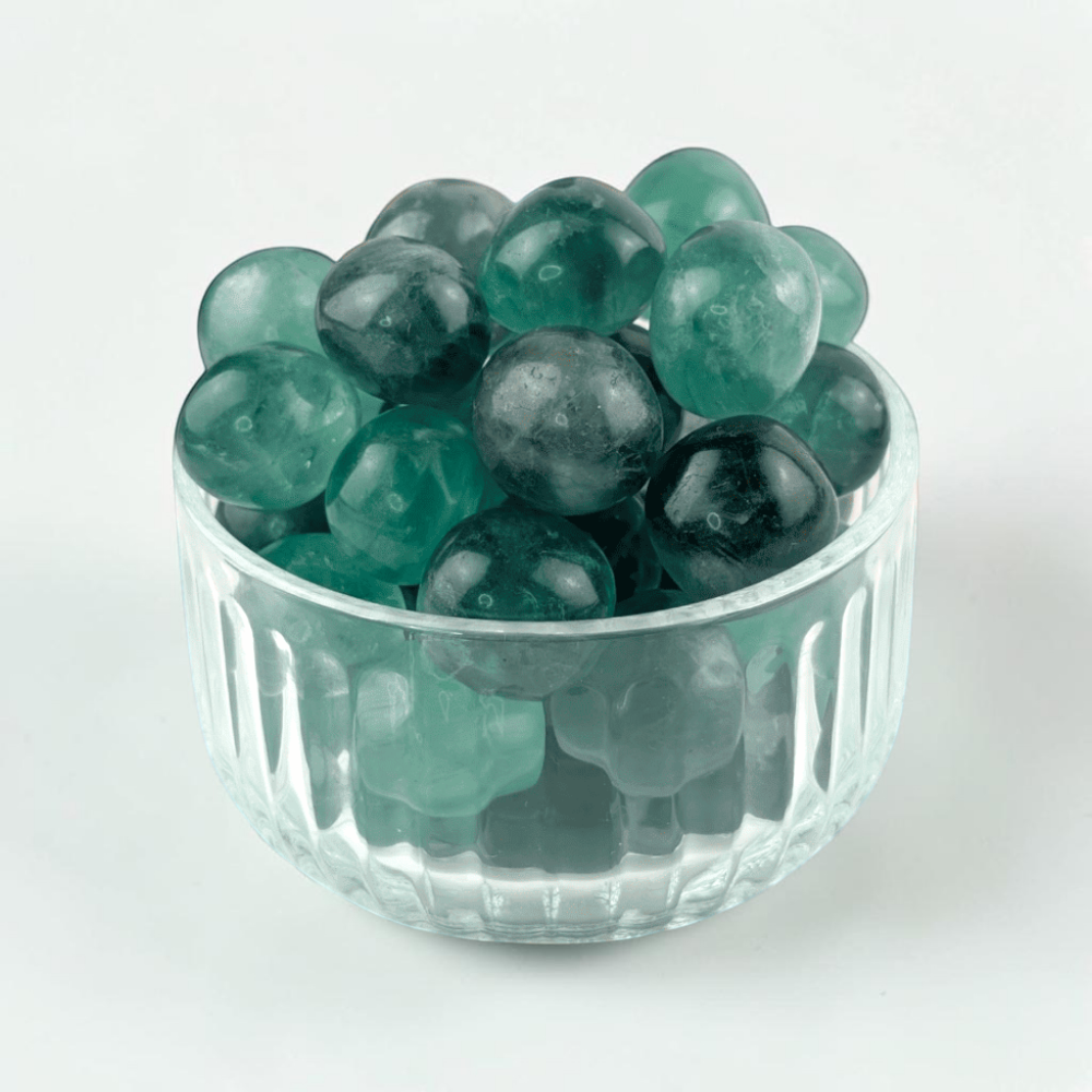 Polished green crystal tumble for healing rituals