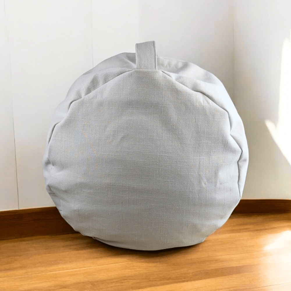 Neutral grey yoga bolster for restorative poses