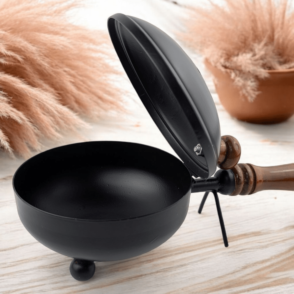 Iron resin burner with wooden handle and lid