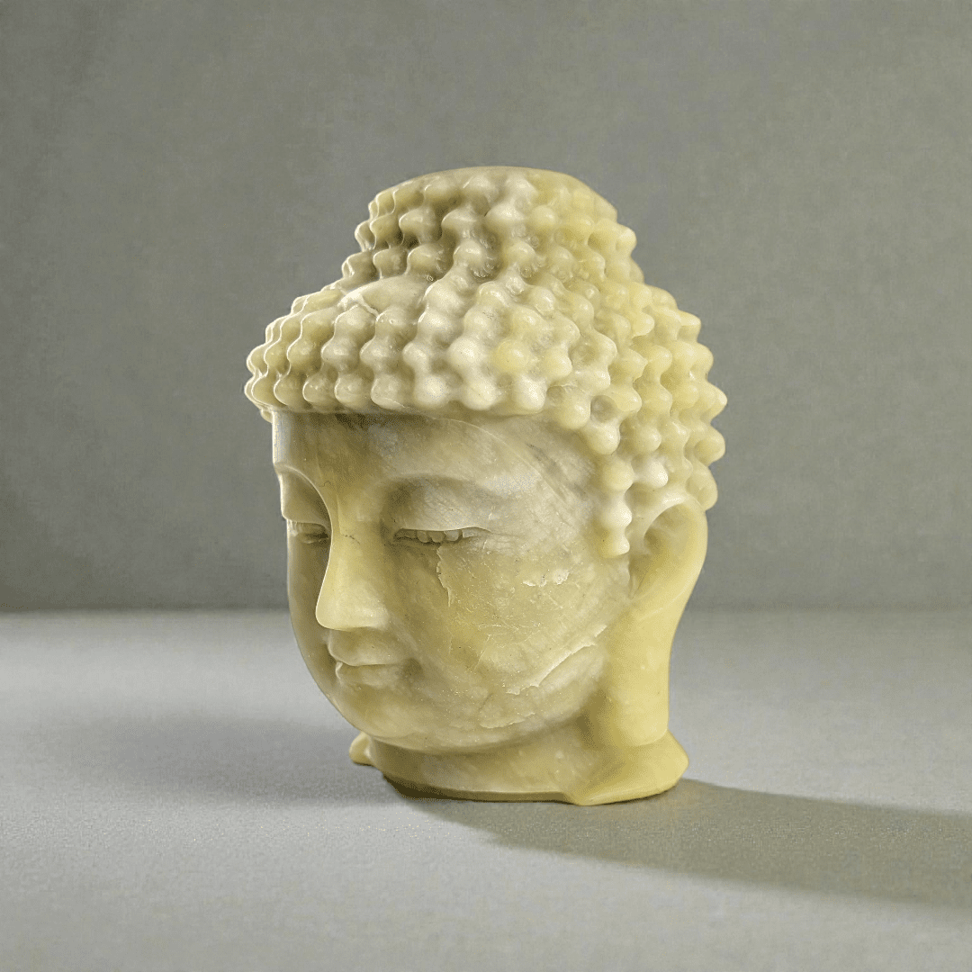 Polished jade crystal Buddha head statue statement piece for meditation space. available at zen collection Canadian metaphysical store near me Barrie
