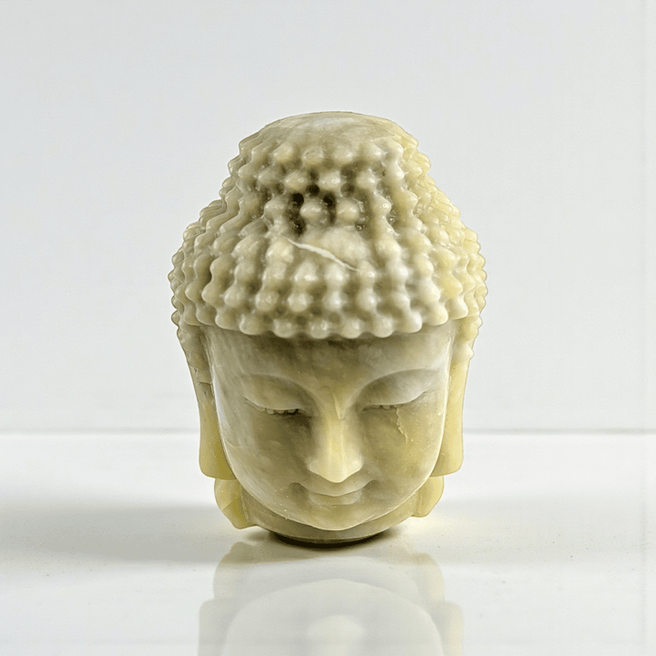Polished jade crystal Buddha head statue statement piece for meditation space. available at zen collection Canadian metaphysical store near me Barrie