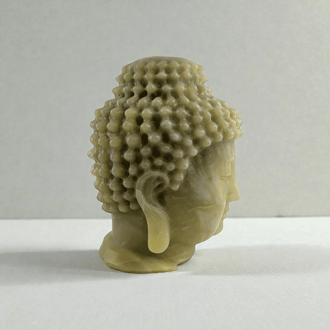 Polished jade crystal Buddha head statue statement piece for meditation space. available at zen collection Canadian metaphysical store near me Barrie