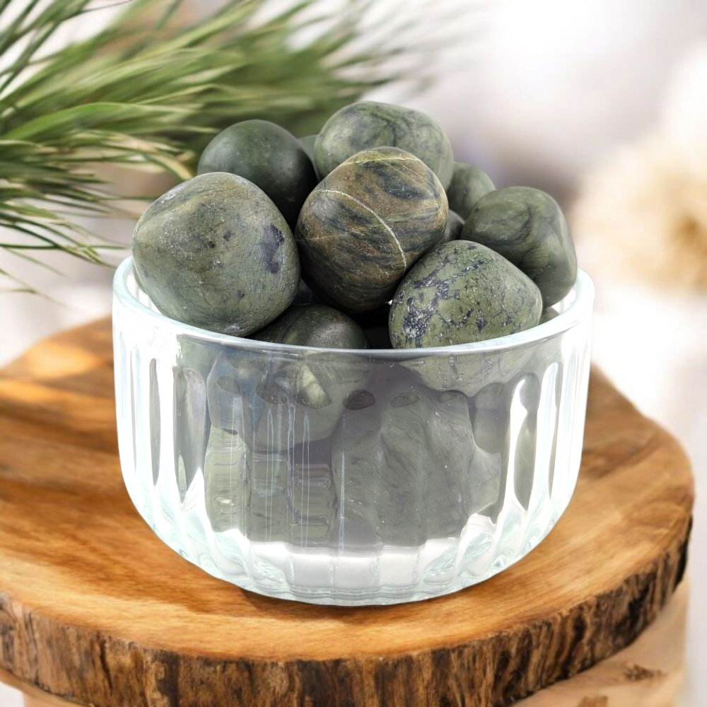 Polished dark green Jade tumbled stones for healing