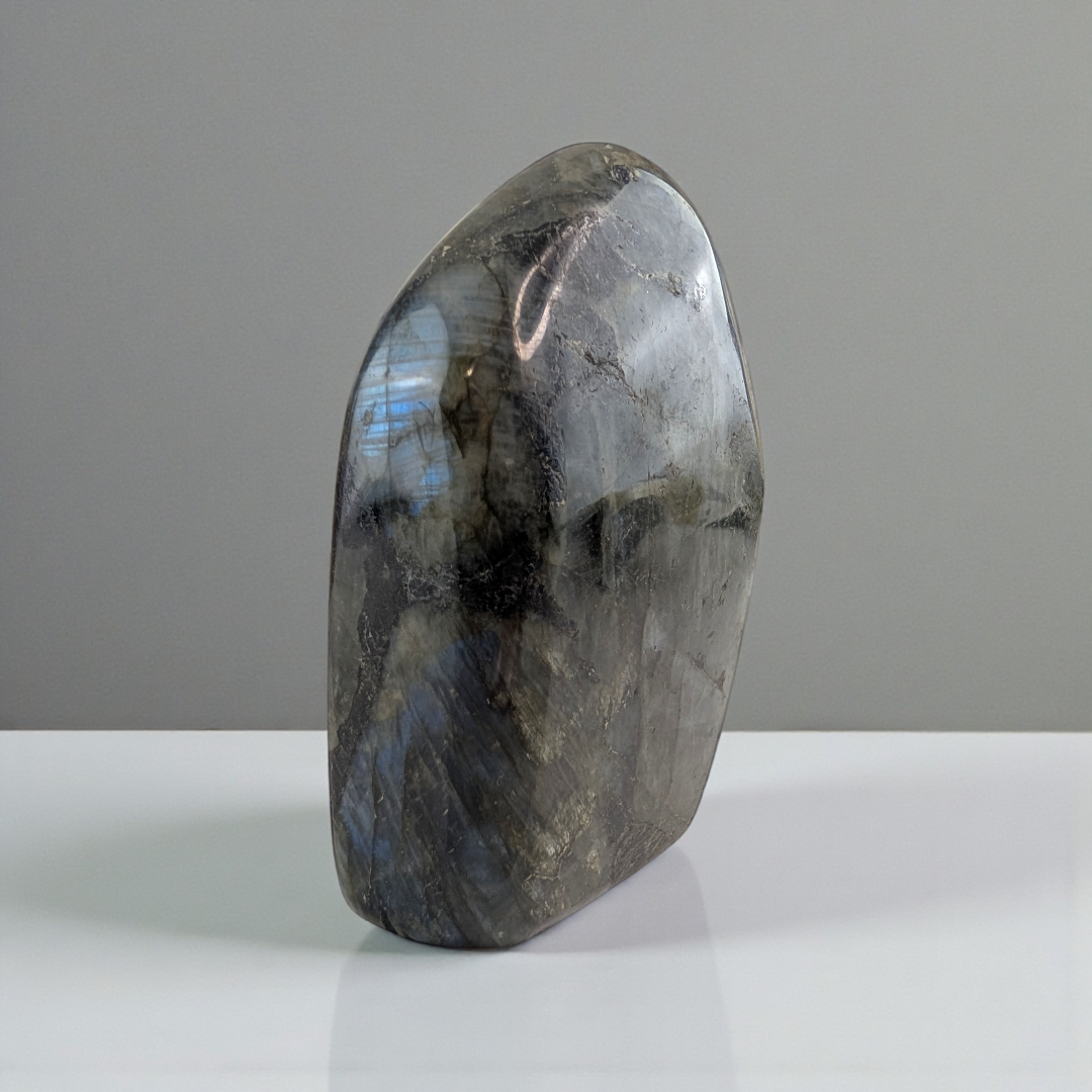 Third eye Labradorite stone on a gray background available at Zen Collection Metaphysical Store in Barrie Ontario. Shop In-store or Online Now 