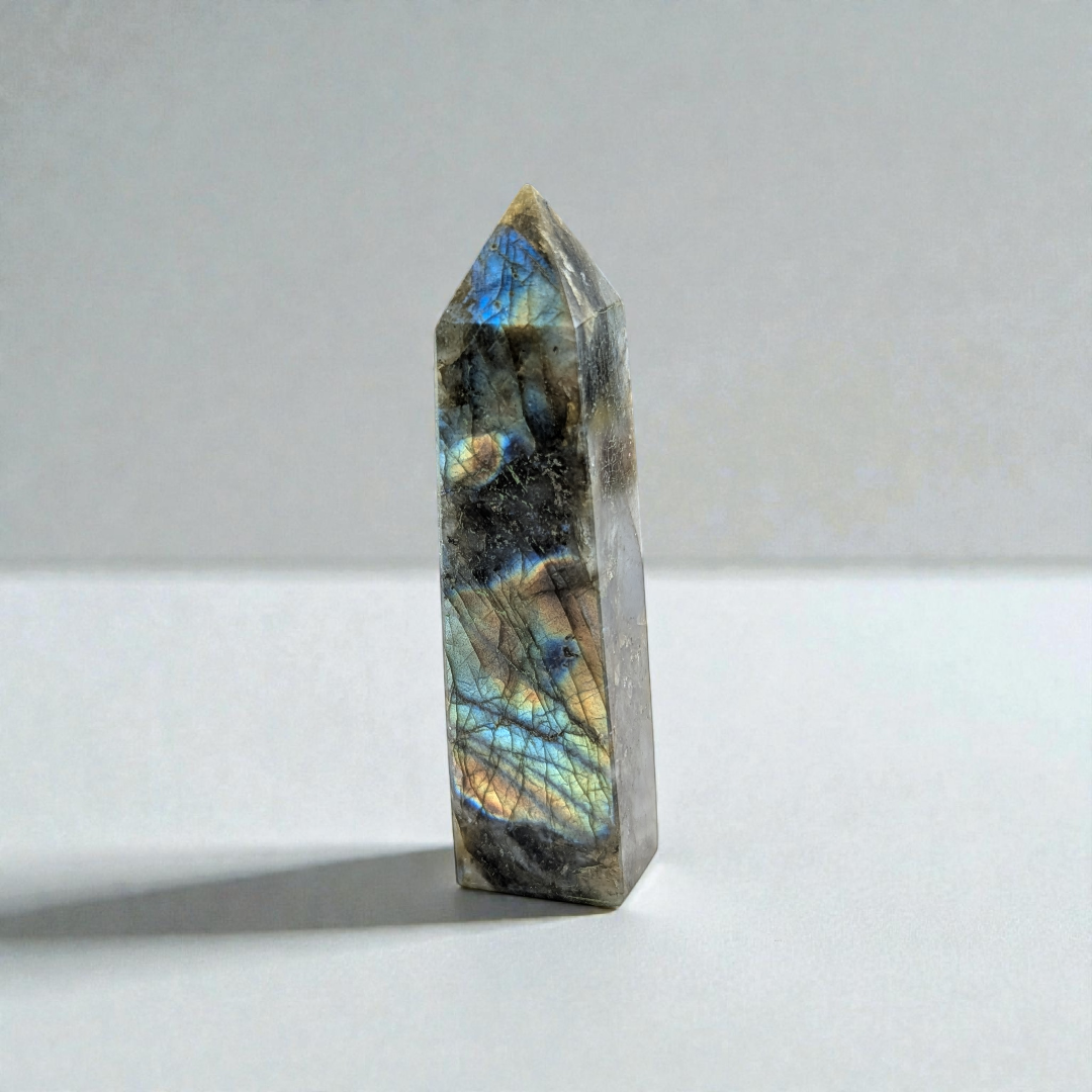 Side view of Labradorite Tower reflecting light in a sacred space.