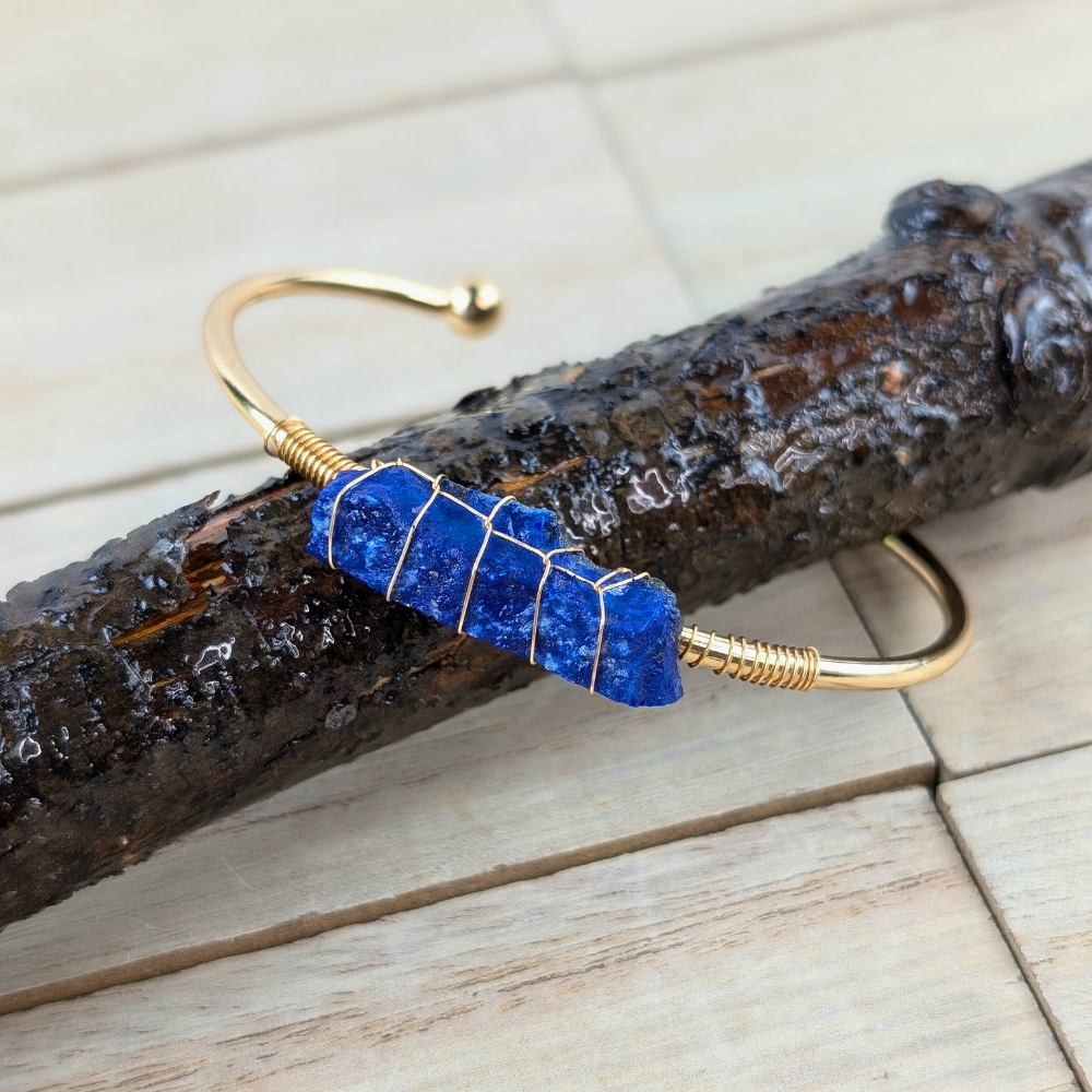 Close-up of Lapis Lazuli earrings with delicate gold wire wrapping