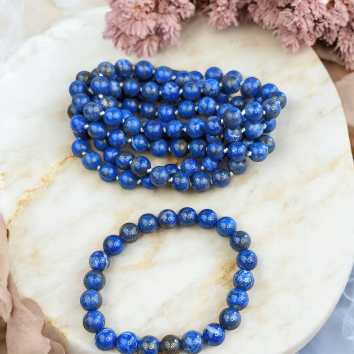 Genuine Lapis Lazuli mala beads for throat and third eye chakra. Shop in-store or online now with Zen Collection Canadian crystal store
