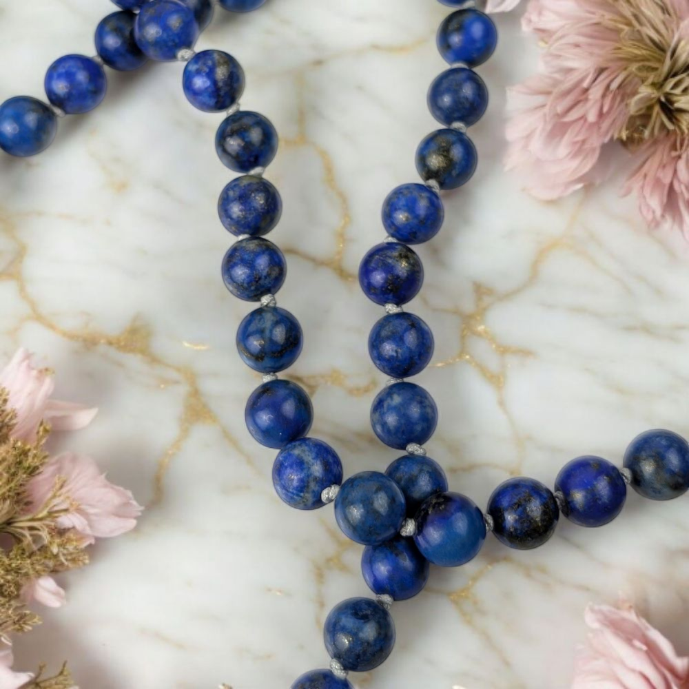 Genuine Lapis Lazuli mala beads for throat and third eye chakra. Shop in-store or online now with Zen Collection Canadian crystal store