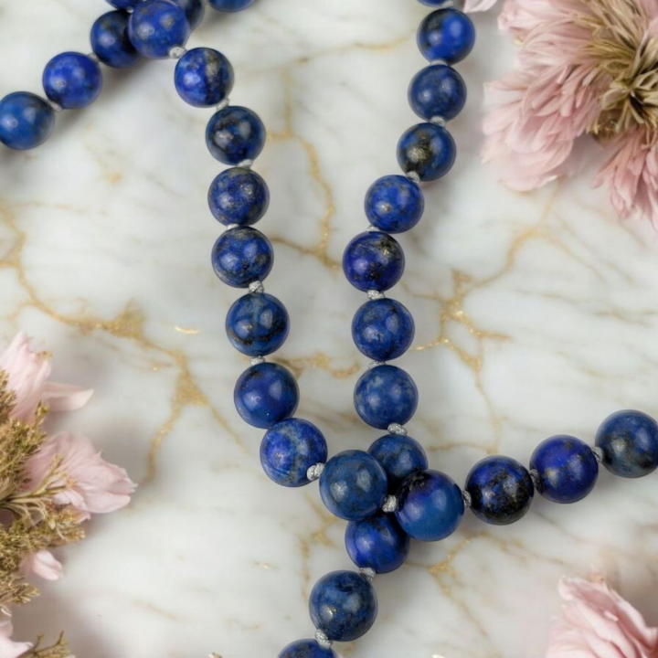 Genuine Lapis Lazuli mala beads for throat and third eye chakra. Shop in-store or online now with Zen Collection Canadian crystal store