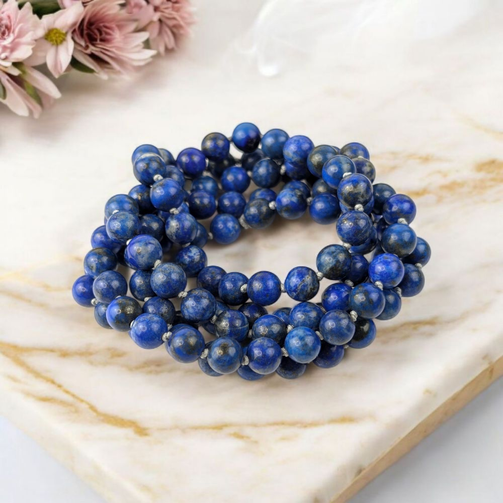 Genuine Lapis Lazuli mala beads for throat and third eye chakra. Shop in-store or online now with Zen Collection Canadian crystal store