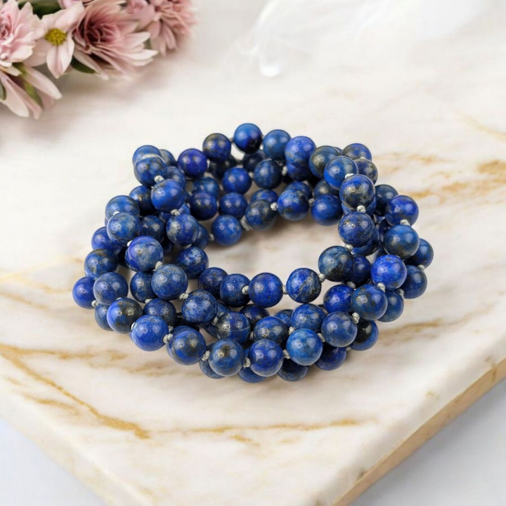 Genuine Lapis Lazuli mala beads for throat and third eye chakra. Shop in-store or online now with Zen Collection Canadian crystal store