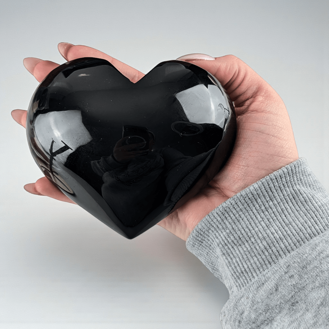 black obsidian crystal heart for root chakra protection. Shop now with Zen Collection Metaphysical Store Canada. Shop in-store or online now.
