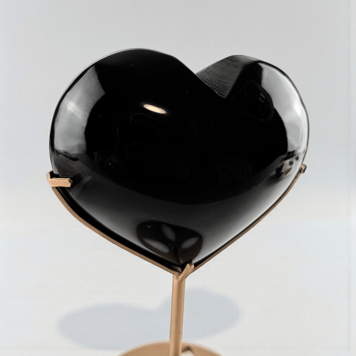 black obsidian crystal heart for root chakra protection. Shop now with Zen Collection Metaphysical Store Canada. Shop in-store or online now.