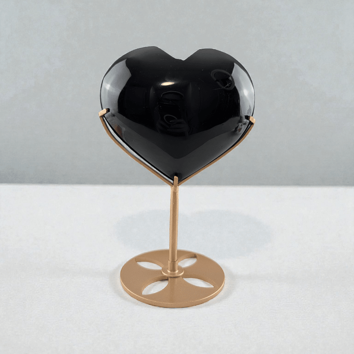 black obsidian crystal heart for root chakra protection. Shop now with Zen Collection Metaphysical Store Canada. Shop in-store or online now.