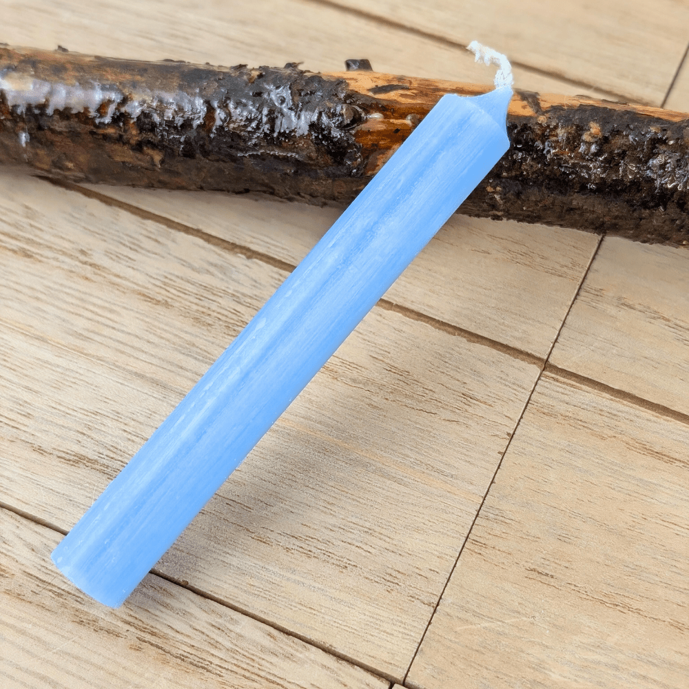 Light blue candle for meditation and intention-setting