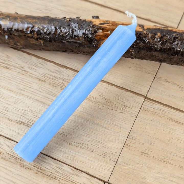 Light blue candle for meditation and intention-setting
