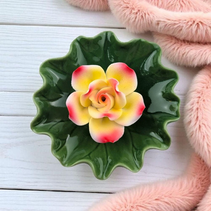 porcelain lotus incense burner design on a white surface