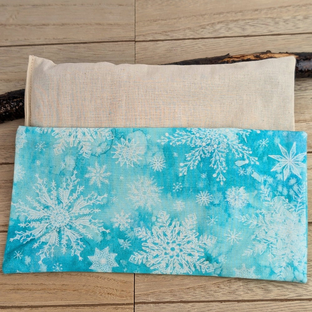 Snowflake-patterned Minty Fresh Eye Pillow handcrafted with natural flaxseed