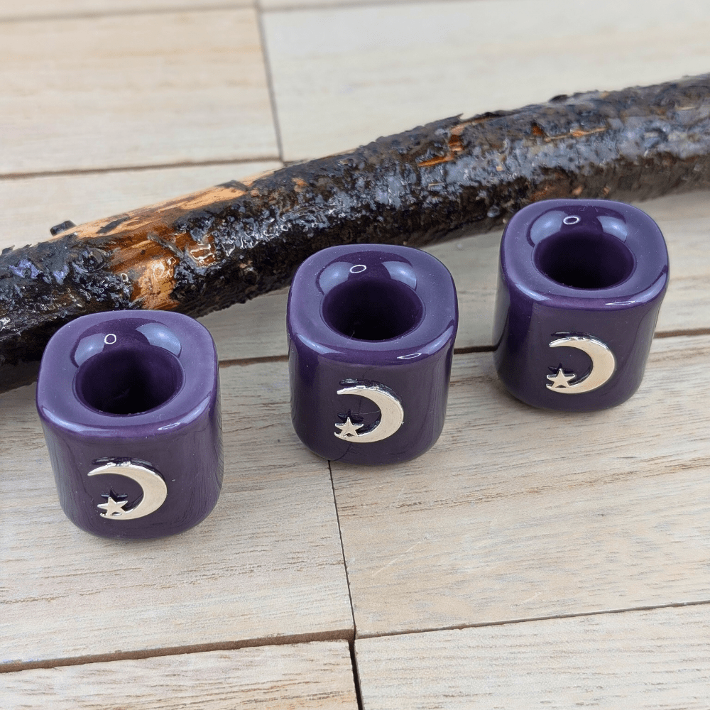 Spiritual candle holder with moon and star design