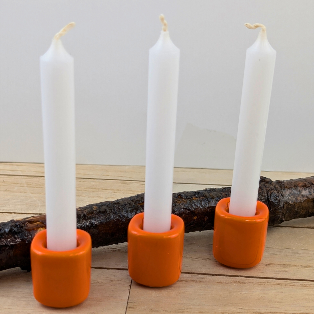 Bright orange mini candle holder for creativity