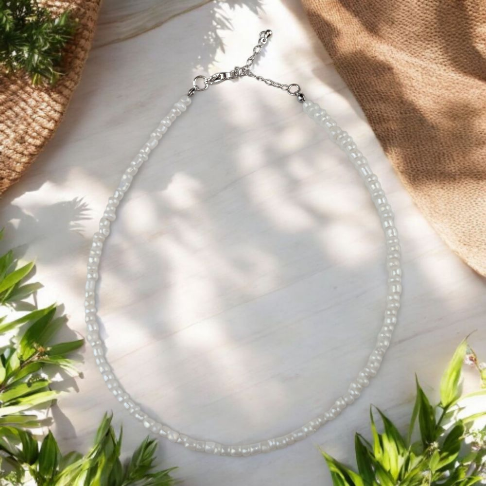 White stretch bracelets and anklets