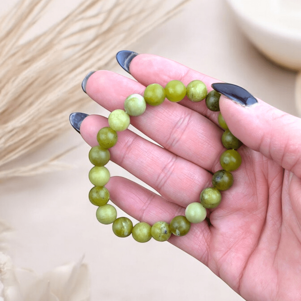 Close-up of Peridot Bracelet showcasing olive green hues.