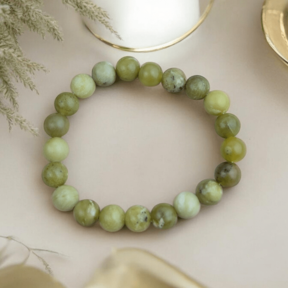 August birthstone bracelet featuring peridot in yellowish green tones.