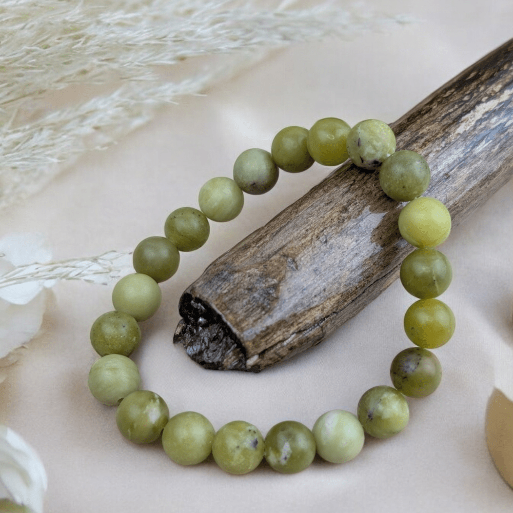 Peridot Crystal Bracelet for emotional healing and abundance.