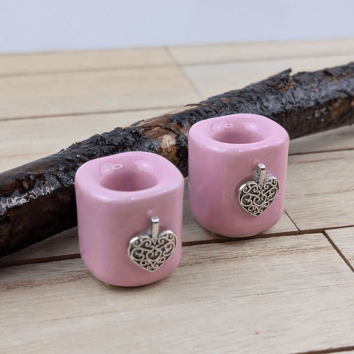 Mini chime candle holder in pink with intricate heart design