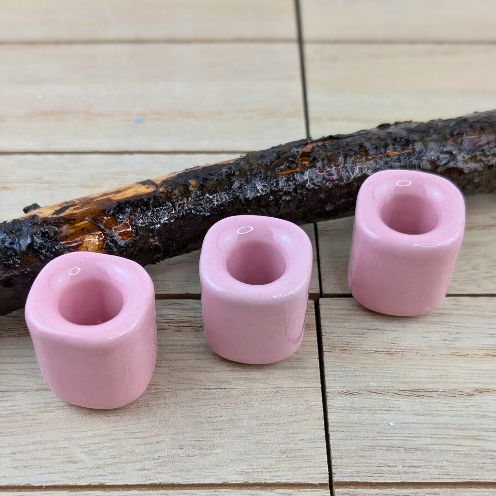 Light pink candle holder for love and forgiveness practices