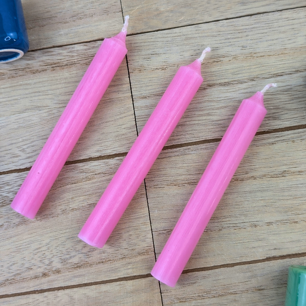 Set of pink candles for love and healing rituals