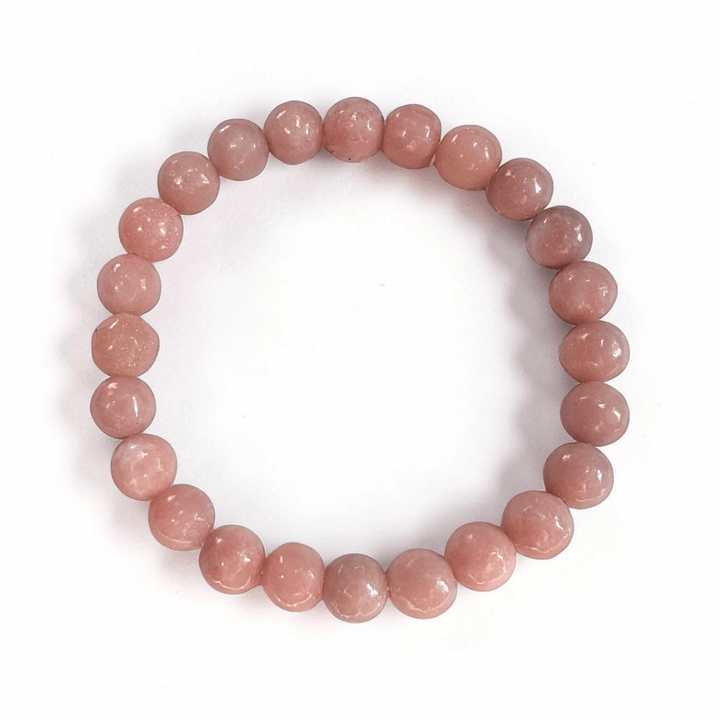 Pink opal stretch bracelet for inner peace and emotional comfort for the heart chakra. Available at Zen Collection Crystal Store in Barrie. Shop in-store or online now