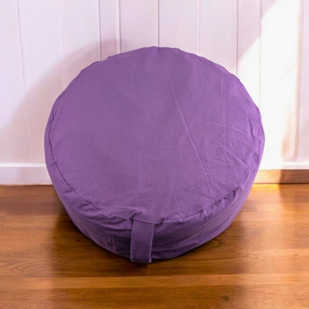 Meditation cushion on wooden floor