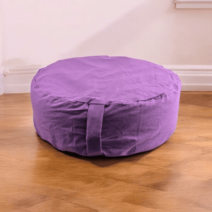 Purple yoga bolster for restorative poses