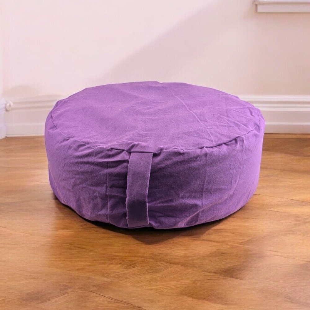 Purple yoga bolster for restorative poses