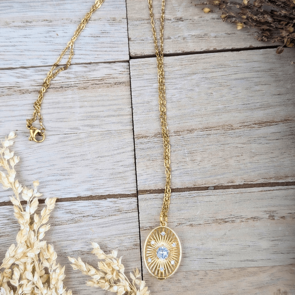Celestial sunburst necklace, metaphysical jewelry for inner strength and light.