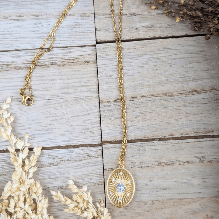 Celestial sunburst necklace, metaphysical jewelry for inner strength and light.